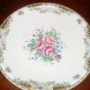 Piatto ceramica Limoges, decorato a mano e bordi dorati.
